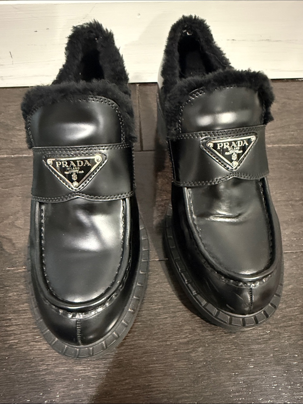 Prada Black Leather Fur-Trim Slip-On Loafers with Logo Plaque